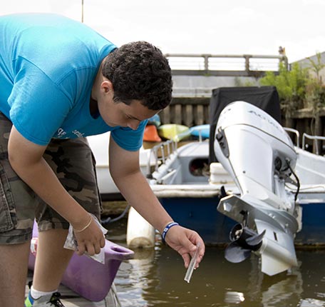 Taking a water sample from the river at The Independence Seaport Museum