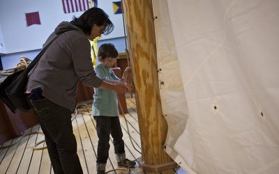 Mother and son interacting with rigging at The Independence Seaport Museum