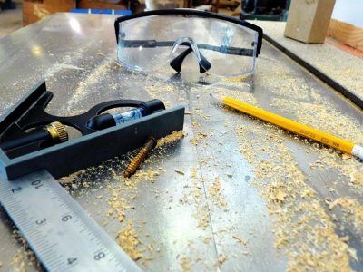 tools sitting on a table saw